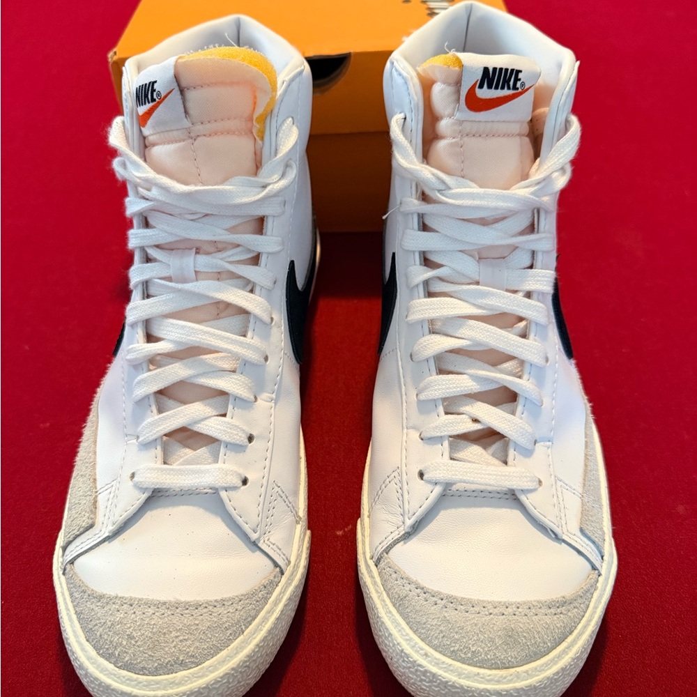 Nike Women’s White High-Top Sneakers with Black Swoosh